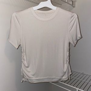 Lululemon top. Sand color. Size 6. Never worn